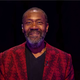 Actor and comedian Sir Lenny Henry. (Imagine there are 19 other people crowded into this picture, please.)
